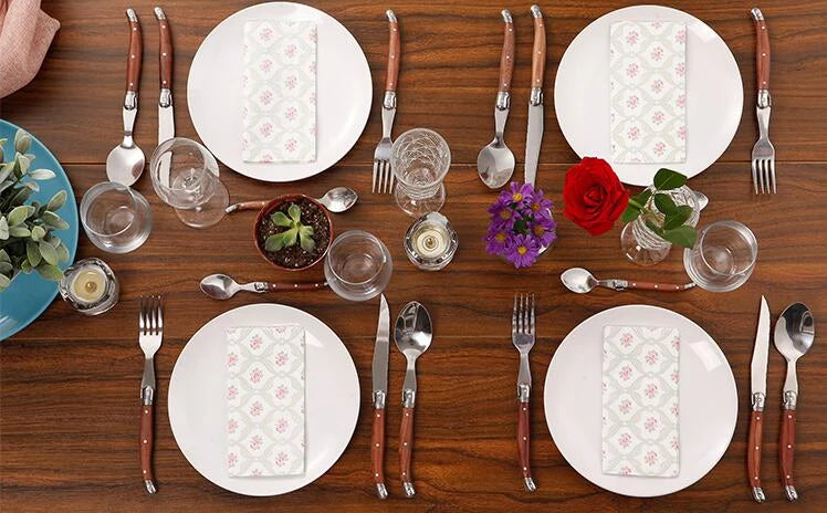 Beautifully set table with rosewooden cutlery