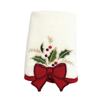 Cotton towel with a unique three-dimensional embroidered bow design, a standout holiday decoration.