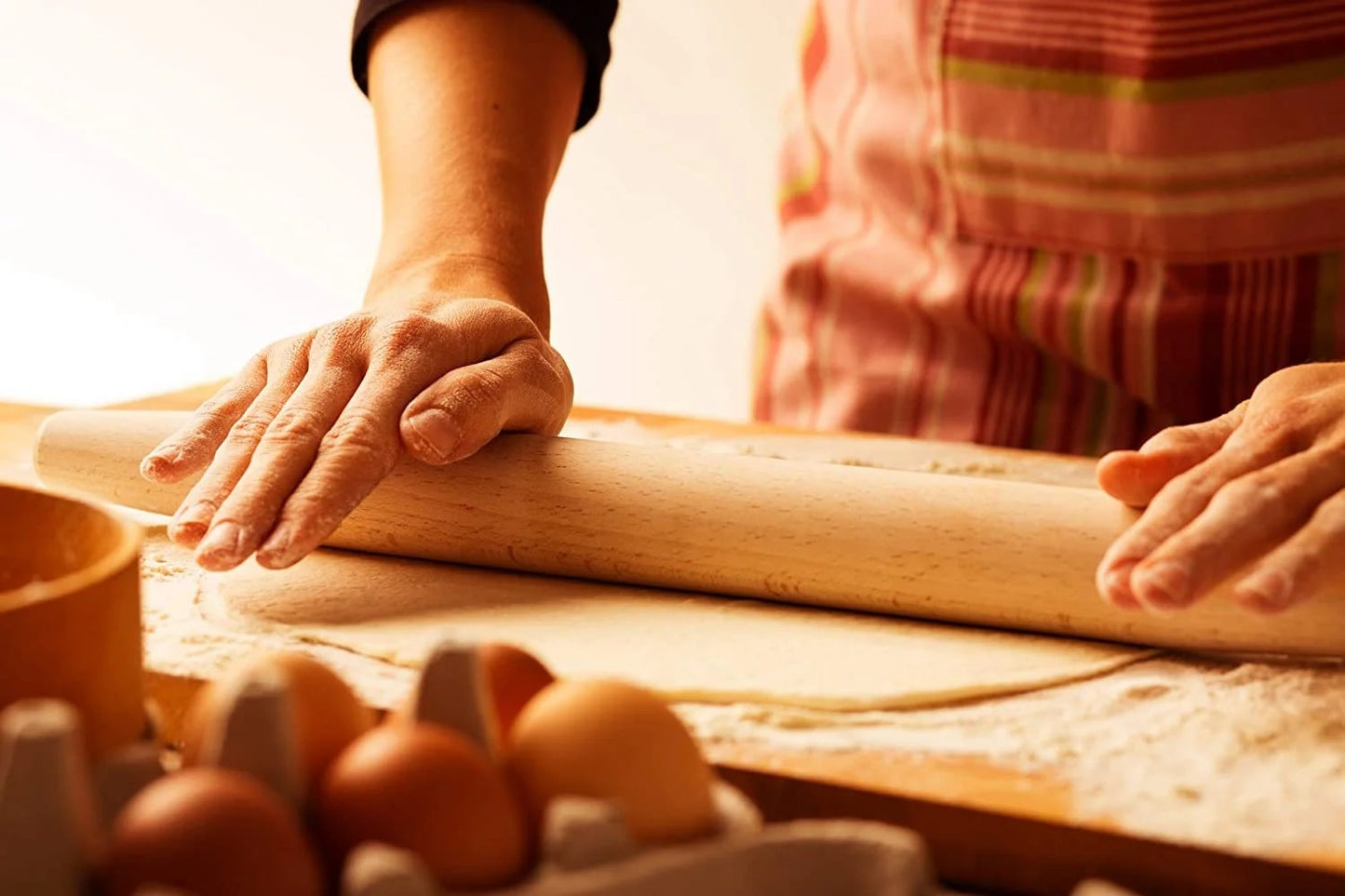 The traditional French rolling pin has tapered end for more precise dough rolling.