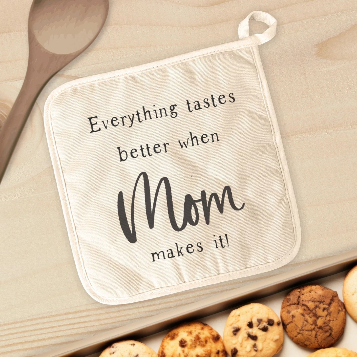 "Everything tastes better when Mom makes it!" This cotton pot holder is a perfect Mother's Day gift.