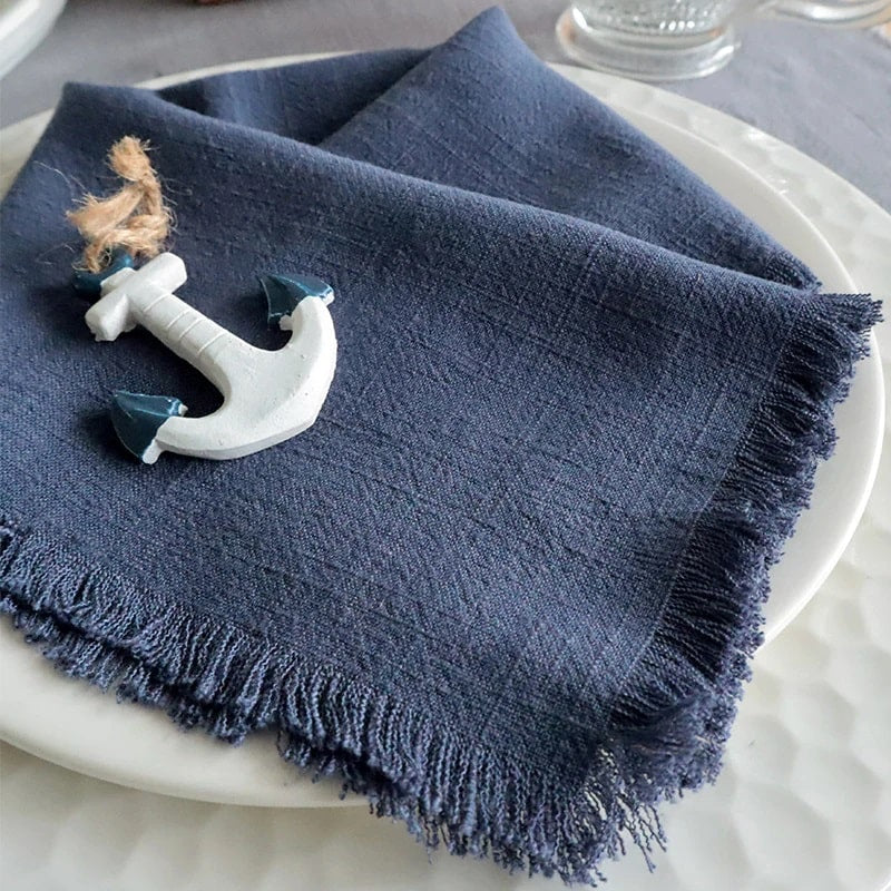 Chic dark blue cotton napkin, adding sophistication to dining experience.