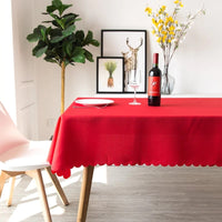 A red fabric stain resistant tablecloth