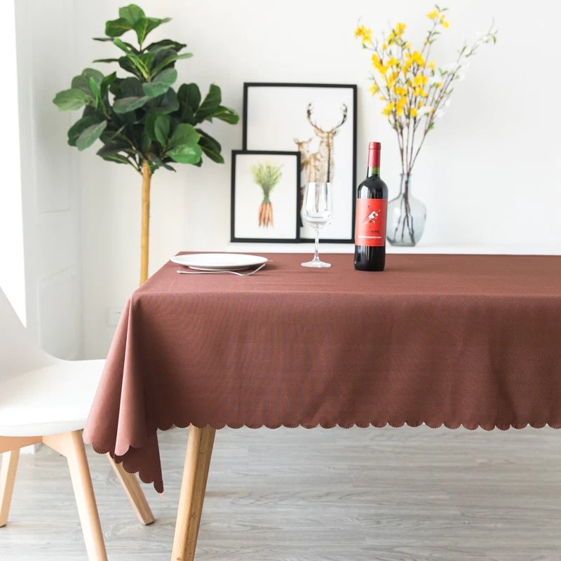 A coffee brown table cloth crafted from polyester