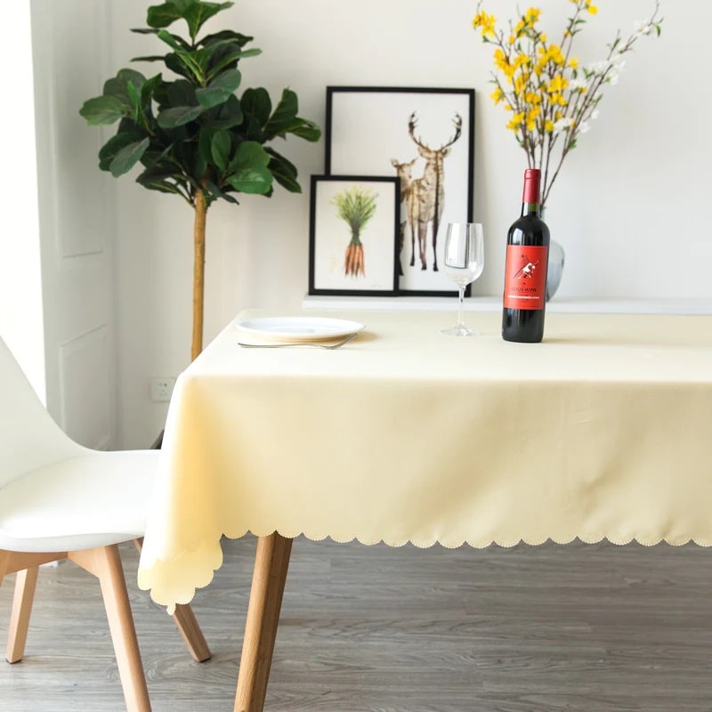 Cream color wrinkle-free table cloth with exquisitely designed edges