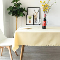 Cream color wrinkle-free table cloth with exquisitely designed edges