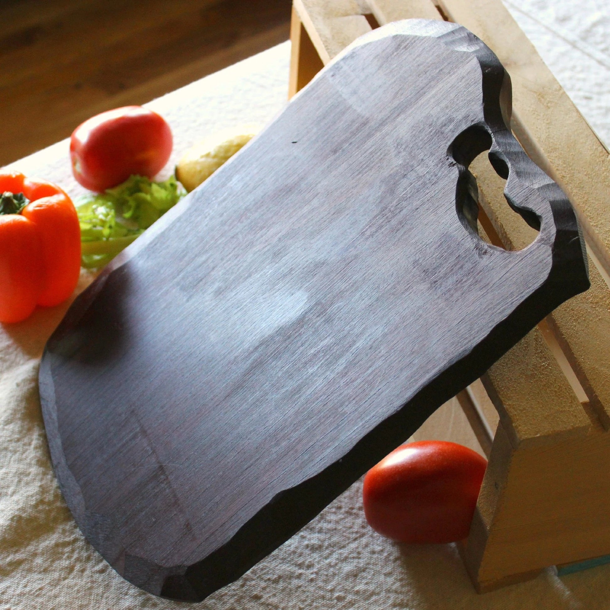 An elegant solid wood cutting board, perfect for kitchen tasks. Make it your constant companion and you won't be disappointed