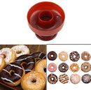 A donut mold and delicious ready made round desserts