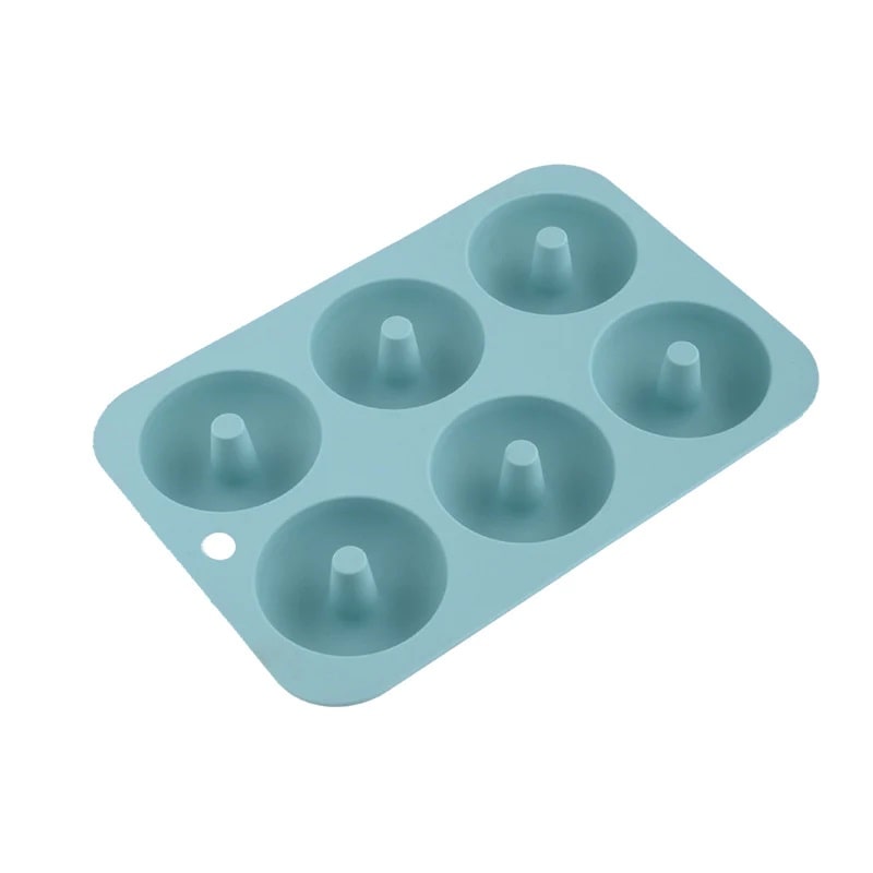 A blue silicone baking pan for donuts, offering carefree baking with no need to handle boiling hot oil.