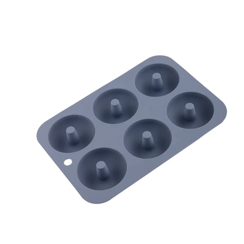 A grey silicone doughnut mold for six doughnuts