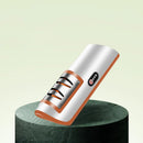 An orange USB chargeable knife sharpener with non-slip base for safe sharpening