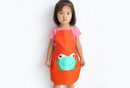 Orange kids apron for helping out in the kitchen