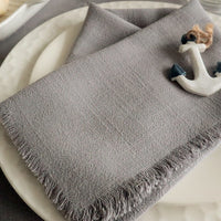 A grey table napkin suitable for every occasion