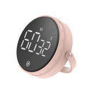 A pink rotatory kitchen timer ensuring perfectly cooked pasta