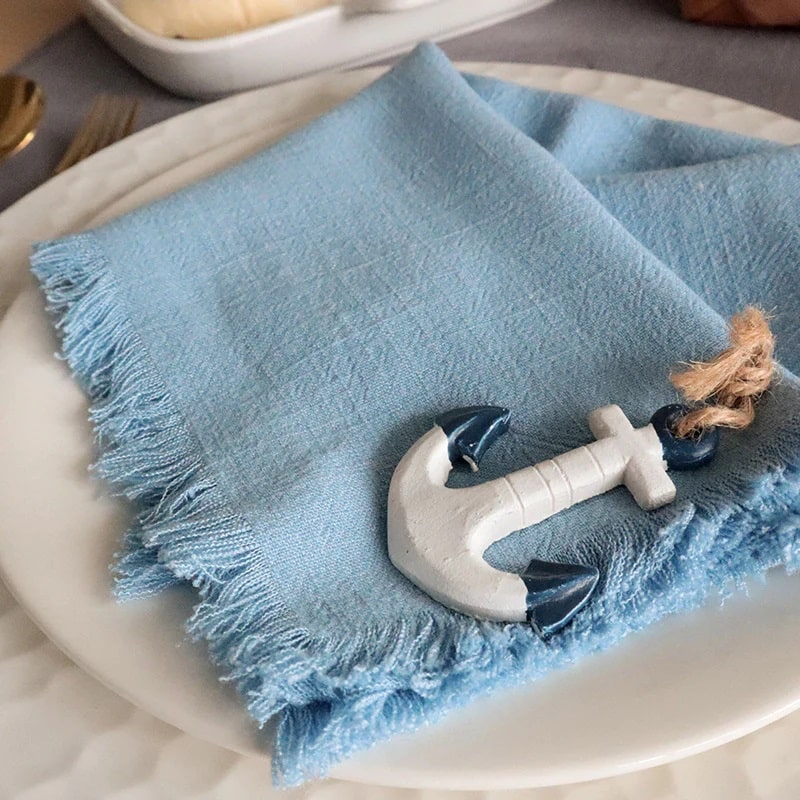 Set your table with these cute blue napkins with fringe edges