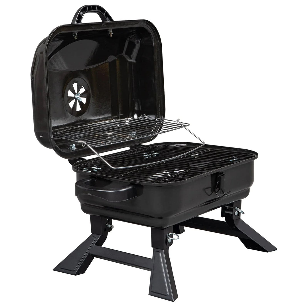 Portable charcoal grill with folding legs