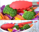 Silicone tongs serving a bowl of fresh vegetables.