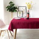 Choose the allure of a wine red tablecloth for a charming and romantic evening ambiance.